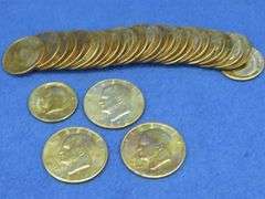 30 clad Kennedy halves and three Eisenhower dollars