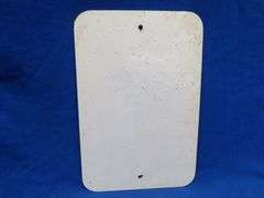 Plastic like No Hunting or Shooting sign that has been hunted