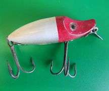 Vintage Heddon 2 1/2" River Runt in a box marked "9110-SD standard" both in excellent condition, and