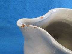 Blue band pitcher with repaired spout. Not marked