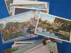 Hundreds of  Golden Era postcards both used and unused going back to the early 1900s.  RRPCs, town v