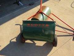 Scott's spreader and a sod roller