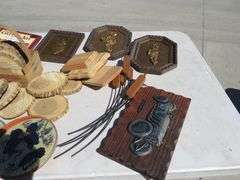 Box lot with wall art, wood cookies, and more