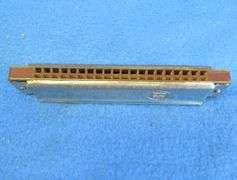 Johann Schrunk Castle Brand tremolo key of C harmonica with 20 holes.