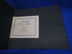 Three vintage photo albums. One has over 500 photos or postcards of bridges. Two are unused