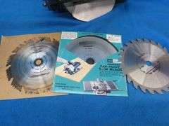 Craftsman 7" circular saw in a metal case.  Includes 3 new and 3 used extra blades.