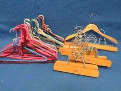 George Foreman grill including scraper and two drip trays also 18 wrapped clothes hangers with 12 pa