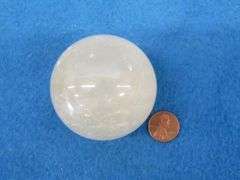 Honey Calcite Sphere and a Satin Spar Cube.  Total weight 1.15 lb.
