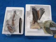 Four porcelain eagles.  Two are in their original boxes.