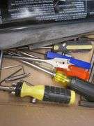 Hand tools including screwdrivers, files, sharpening stones, and more