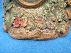 Lux wood and plaster painted parrot clock.  Movement works but hands don't move.
