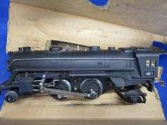 Vintage Lionel Train set with lots of cars, track, and some cool accessories