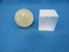 Honey Calcite Sphere and a Satin Spar Cube.  Total weight 1.15 lb.