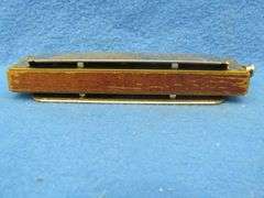 Wm. Kratt Super "48" chromatic harmonica with a soft case