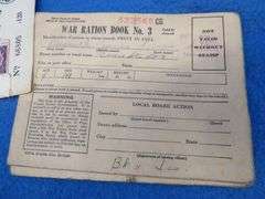 1940 CCC (Civilian Conservation Corps) discharge papers, WW2 ration books with and without stamps, a
