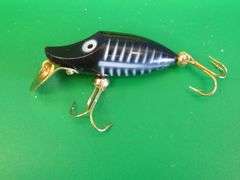 Vintage Horrocks-Ibbotson 3 1/2" Go-Getter with tack eyes, and a Heddon Tiny Runt
