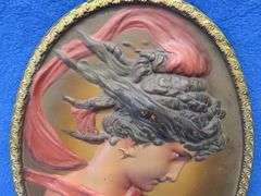 Embossed Bradley and Hubbard #1820 cast iron oval portrait