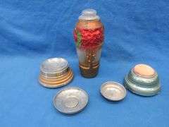 Two working music box/powder boxes and a painted glass vase/urn with lid