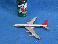Northwest Orient metal airplane