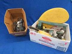 Yard care items such as sprinkers and sprayers, a submersible pump that powered up, and more
