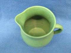 Stoneware pitcher and covered jar