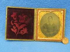 Antique tintype photo in a locking case.  Very good condition.