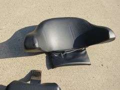 Never used motorcycle trunk and four traffic cones