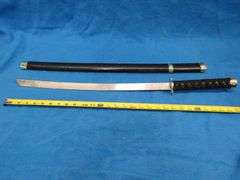 Three-sword set with scabbards and display stand