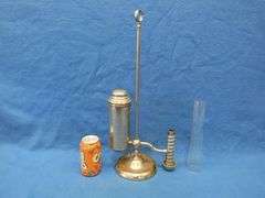 Antique unmarked oil lamp with chimney.  Missing the chimney holder.