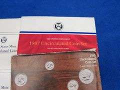 Seven Mint coin sets   (2) 1984 1985 (2) 1987 (2) 1988