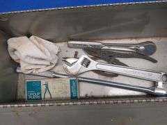 Metal toolbox with contents, including many Craftsman sockets,  ratchets, extensions, and more inclu