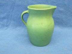 Stoneware pitcher and covered jar