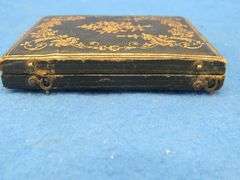 Antique tintype photo in a locking case.  Very good condition.