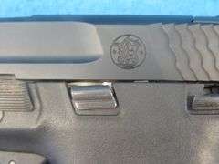Smith and Wesson MP9 Shield 9mm semi-auto pistol.  SN HAP2821.  Includes two magazines and a molded 