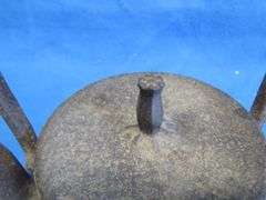 Antique cast iron teapot with Asian makers mark