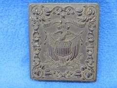 Civil-War-era tintype in a military-themed case.  Very good condition.  Hand-colored photo of a sold
