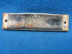 Harmonic Reed Co. All-Star 10-hole diatonic harmonica.  Sounds great.  Has some surface rust.