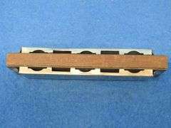 Seydel's 10-hole tremolo Glee Club harmonica in the key of C.  Sounds great.