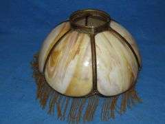 14" caramel slag glass shade with beaded fringe.  Very good condition.