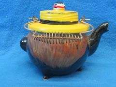 Black Americana teapot.  Made in Japan and hand-painted.