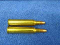 20 mixed 225 Win rounds in a vintage Winchester Western Cartridge Case box