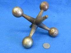 Large decorative chrome-plated cast iron toy jack.
