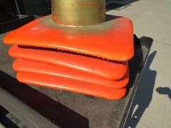 Never used motorcycle trunk and four traffic cones