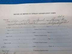 1940 CCC (Civilian Conservation Corps) discharge papers, WW2 ration books with and without stamps, a