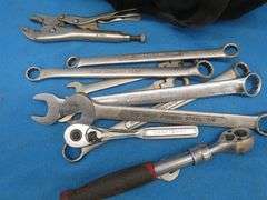 Two tool bags with contents including Snap-On, Craftsman, Husky, and more