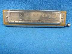 Wm. Kratt Super "48" chromatic harmonica with a soft case