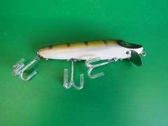 Vintage Heddon "wood 4 5/8" Basser in excellent condition in a box marked 7500 M Vamp