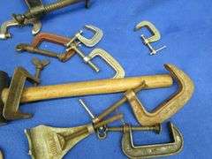 Different sized C-clamps and a rubber mallet