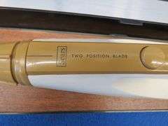 Sears electric carving knife and four placemats with historic Minnesota landmarks