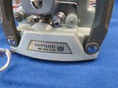 Vernon Model 101 8mm movie editor and a box of test leads